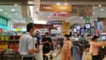 Shenzhen, China: shoppers check out at the cash desk of aeon supermarket