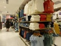 Shenzhen, China: shoppers shop for clothes at uniqlo`s clothing store at night Royalty Free Stock Photo