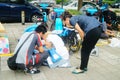 Shenzhen, China: on the sidewalk courier company employees are distributing customer courier