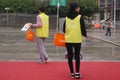 Shenzhen, China: Street by distributing flyers