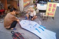 Shenzhen, China: street repair old umbrella Royalty Free Stock Photo