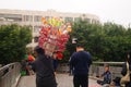 Shenzhen, China: street selling snacks Tomatoes on sticks