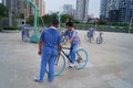 Shenzhen, China: students on bicycles