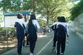 Shenzhen, China: Students at the school on his way home Royalty Free Stock Photo