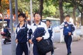 Shenzhen, China: students walk home after school Royalty Free Stock Photo