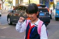 Shenzhen, China: students walk home after school