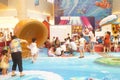 Shenzhen, China: summer holidays, children play at children`s playground