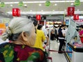 Shenzhen, China: supermarket cashier, customers pay in shopping