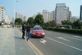 Shenzhen, China: tourists waiting for taxis