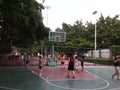 Shenzhen, China: weekend, office workers are playing basketball fitness