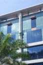 Shenzhen, China: workers clean the glass curtain wall in high-rise building Royalty Free Stock Photo