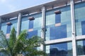 Shenzhen, China: workers clean the glass curtain wall in high-rise building Royalty Free Stock Photo