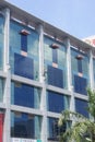 Shenzhen, China: workers clean the glass curtain wall in high-rise building Royalty Free Stock Photo