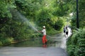 Shenzhen china: workers in watering the trees