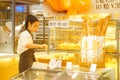 Shenzhen, China: young female employees in bakery