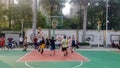 Shenzhen, China: young people play basketball on the basketball court at the stadium