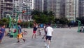 Shenzhen, China: young people play basketball on the basketball court at the stadium