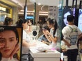 Shenzhen, China: young woman shopping for contact lenses