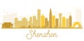 Shenzhen City skyline golden silhouette.