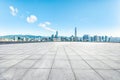 Shenzhen clean square floor and city skyline with mountains background Royalty Free Stock Photo