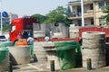 Shenzhen, China: street construction, truck loading and unloading construction materials