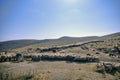 shepherd drives on the mountain route an attara of sheep, the desert mountain area, Azerbaijan Royalty Free Stock Photo