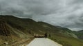 shepherd drives on the mountain route an attara of sheep, the desert mountain area, Gazakh Azerbaijan green field Royalty Free Stock Photo