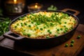 Shepherd\'s pie served with peas, a common accompaniment. Food concept