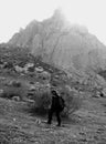 A shepherd walks with his staff through the mountains of Azerbaijan