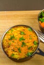 Shepherds or cottage pie in serving dish with parsley, portrait, macro