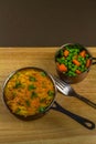 Shepherds or cottage pie in serving dish with parsley, portrait