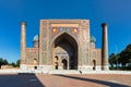 Sher Dor madrasah on Registan square with animals mosaic on fasade in Samarkand , Uzbekistan Royalty Free Stock Photo