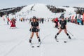 Sheregesh, Kemerovo region, Russia - April 03, 2021: Grelka Fest in Sheregesh. People in carnival costumes on the snow slope Royalty Free Stock Photo