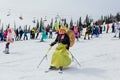 Sheregesh, Kemerovo region, Russia - April 03, 2021: Grelka Fest in Sheregesh. People in carnival costumes on the snow Royalty Free Stock Photo