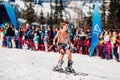 Sheregesh, Kemerovo region, Russia - April 13, 2019: Grelka Fest ski and snowboard riders in bikini