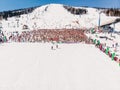 Sheregesh, Kemerovo region, Russia - April 13, 2019: Grelka Fest ski and snowboard riders in bikini. Aerial photo