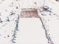 Sheregesh, Kemerovo region, Russia - April 13, 2019: Grelka Fest ski and snowboard riders in bikini. Aerial photo
