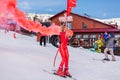 Sheregesh, Kemerovo region, Russia - April 12, 2019: Young happy pretty woman dressed in carnival costume of a red devil riding on