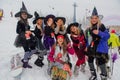 Sheregesh, Kemerovo region, Russia - April 06, 2019: Young women in carnival costumes of witches on the mountain slope