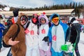 Sheregesh, Kemerovo region, Russia - April 03, 2021: Grelka Fest in Sheregesh. Young people in carnival costumes on the Royalty Free Stock Photo