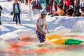 Sheregesh, Kemerovo region, Russia - April 13, 2019: Pool and ride contest where people on a swimming ring playing huge bowling on