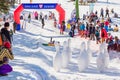 Sheregesh, Kemerovo region, Russia - April 13, 2019: Pool and ride contest where people on a swimming ring playing huge bowling on