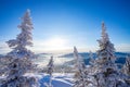 Sheregesh Kemerovo region ski resort in winter dawn sun on city, landscape on mountain and hotels, aerial top view Royalty Free Stock Photo