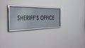 Sheriff office door, law enforcement officer, crime prevention, police authority Royalty Free Stock Photo