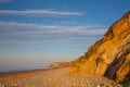 Sheringham beach and cliffs at sunset,,England