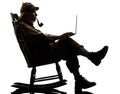 Sherlock holmes silhouette computing Royalty Free Stock Photo