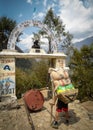 Sherpa porter with a heavy load in Everest Base camp Trek Royalty Free Stock Photo