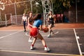 Shes blocked from every angle. a diverse group of sportswomen playing a competitive game of basketball together during