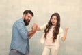 Shes champion. Happy child overcome father in arm wrestling. Girl child won competition. Celebrating victory. Family Royalty Free Stock Photo