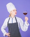 Shes a classy sommelier. Pretty woman holding glass of red wine. Wine professional at work. Adorable wine expert. Wine Royalty Free Stock Photo